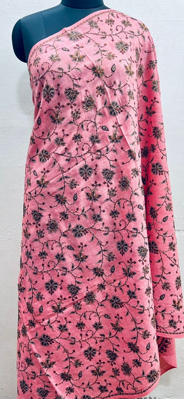 Pink floral Shawl on a mannequin against a white background