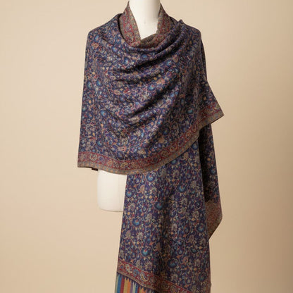 Floral patterned scarf on a mannequin against a beige background