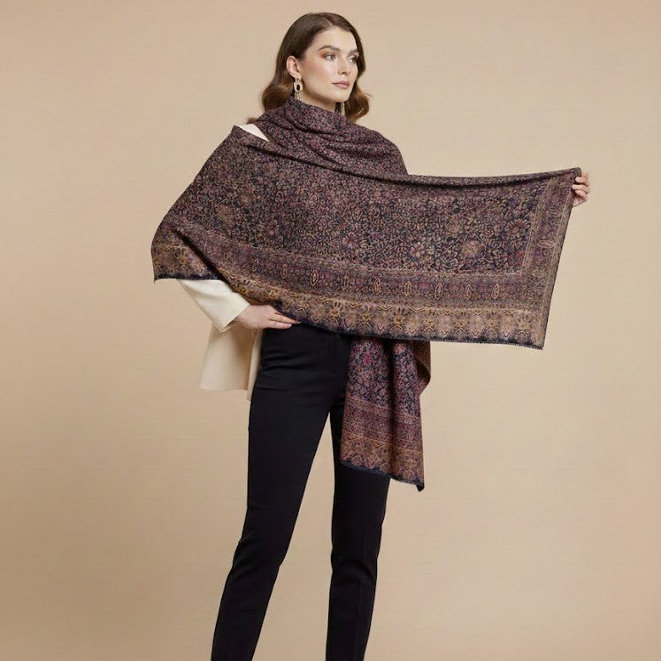 Kani shawl in navy blue on a female model