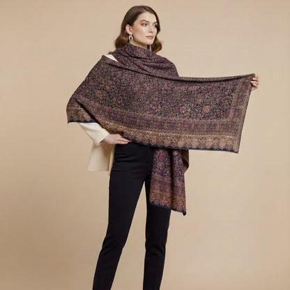 Kani shawl in navy blue on a female model