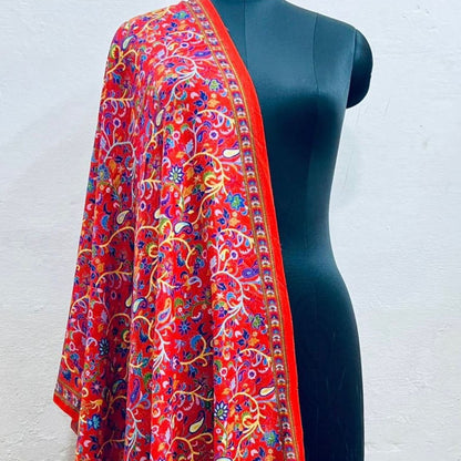 Faux silk blend pashmina kalamari-inspired stole in red draped over a mannequin against a white background