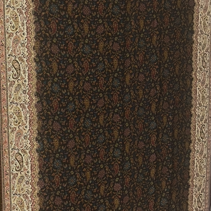 Decorative shawl with intricate patterns on a plain background