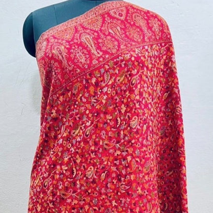 Kani Shawl in red on a female model