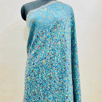 Kani Shawl in sky blue draped on a female mannequin