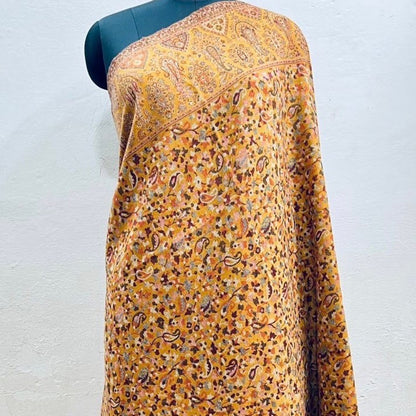 Beautiful yellow kani shawl on a female model