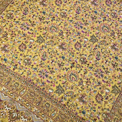 Pure wool kani shawl with sunflower design draped on the floor