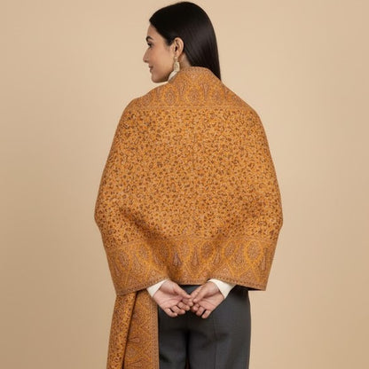Beautiful yellow kani shawl on a female model