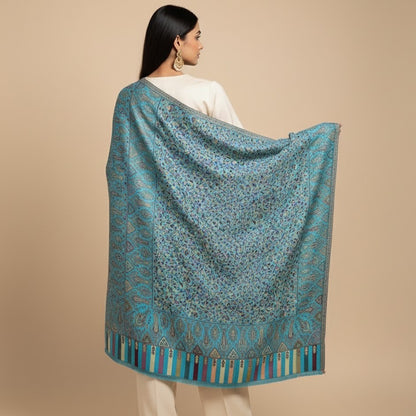 Kani Shawl in sky blue draped on a female model