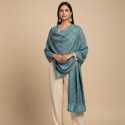 Kani Shawl in sky blue draped on a female model
