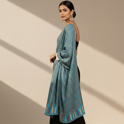 Kani Shawl in sky blue draped on a female model