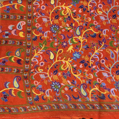 Colorful paisley patterned faux silk blend pashmina kalamari-inspired stole in a red fabric 