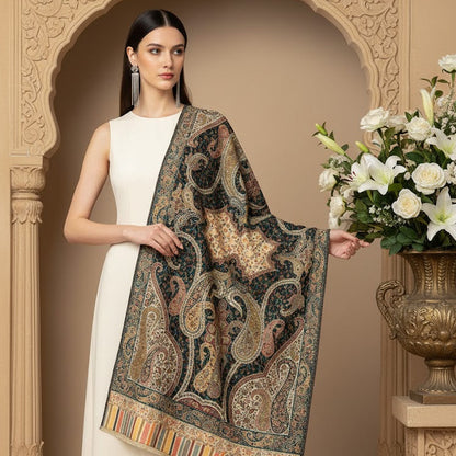 Woman holding a decorative shawl with intricate patterns in a ornate setting